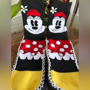 Disney cushioned socks / house shoes. Warm. Only worn once so no skin contact